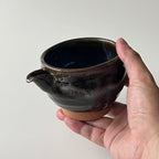 黒釉片口