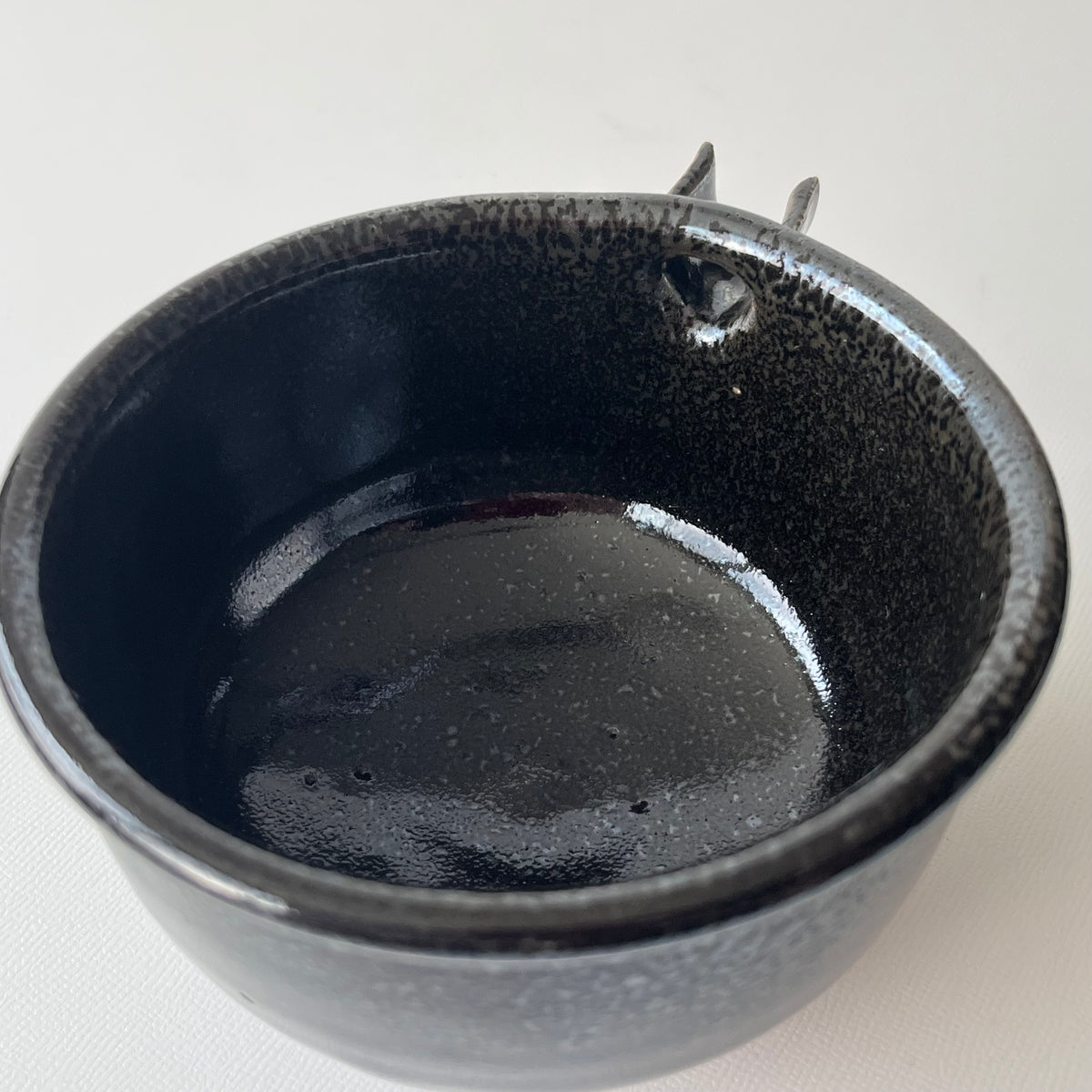 黒釉片口
