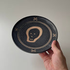 白線文様黒釉皿